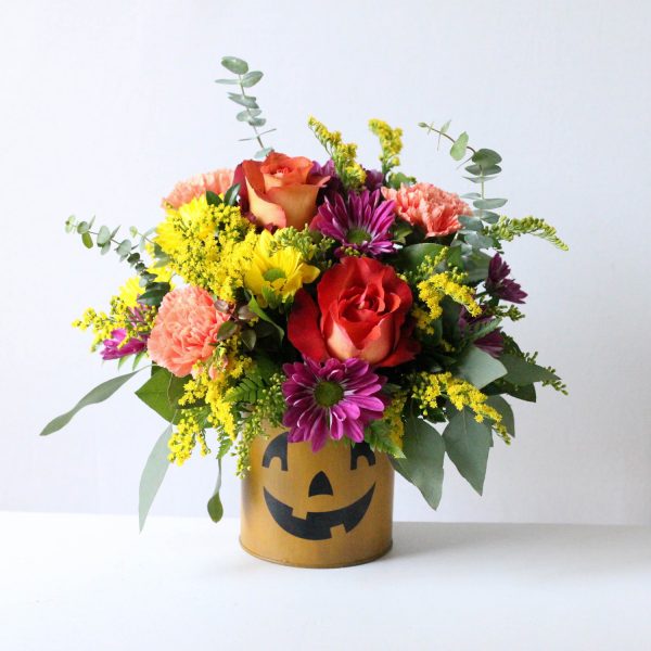 Jack - A flower pot painted to resemble a Jack-O-Lantern