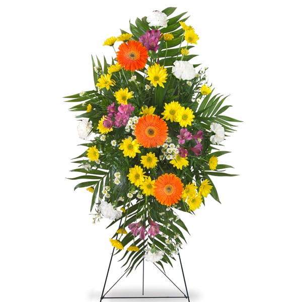 Funeral spray in bright colors. Yellows, orange, pinks.